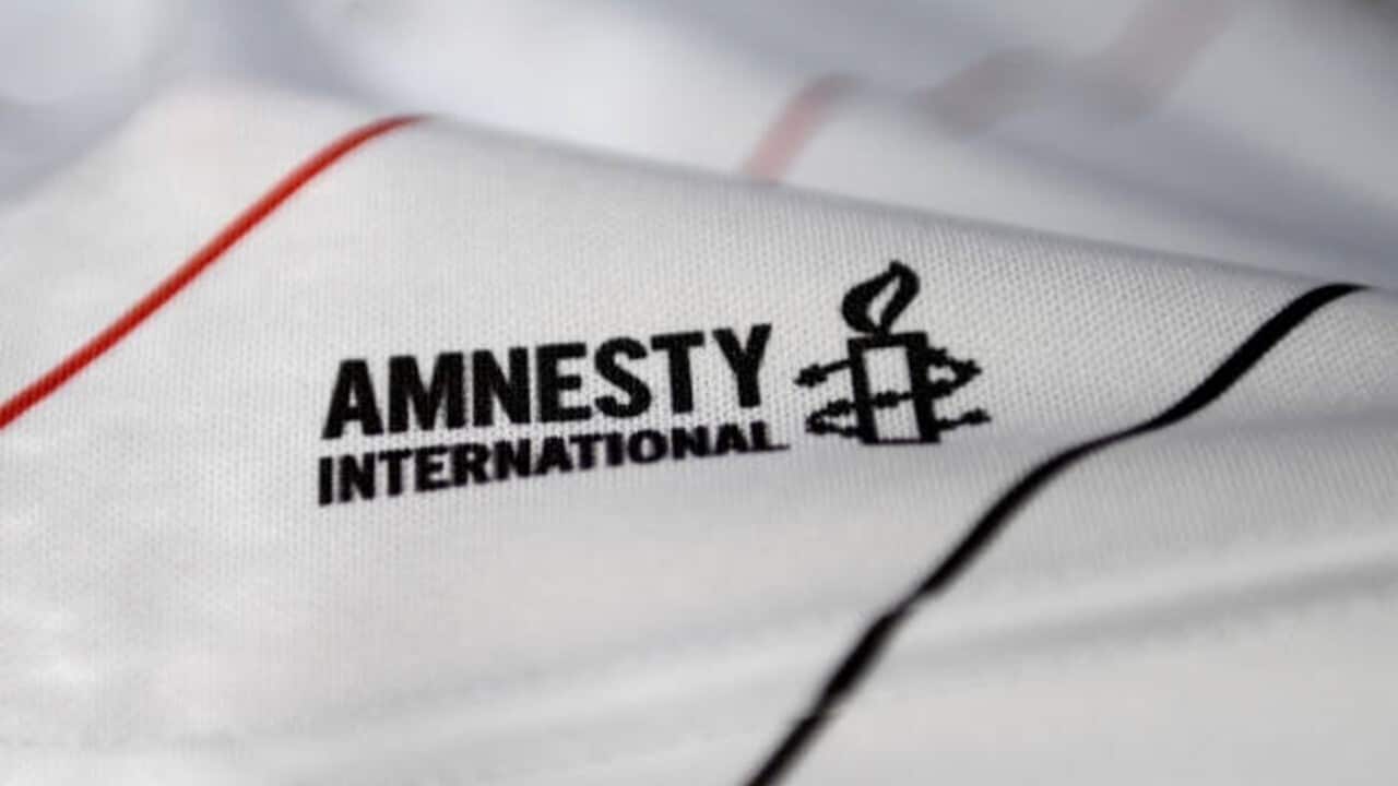 A detailed view of the Amnesty International logo. Getty