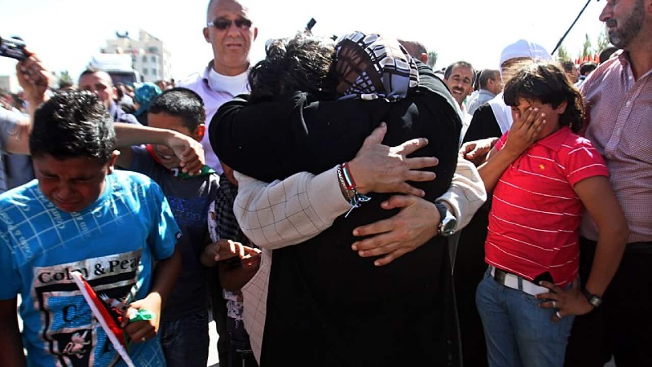 Palestinian prisoners meets their families after their release