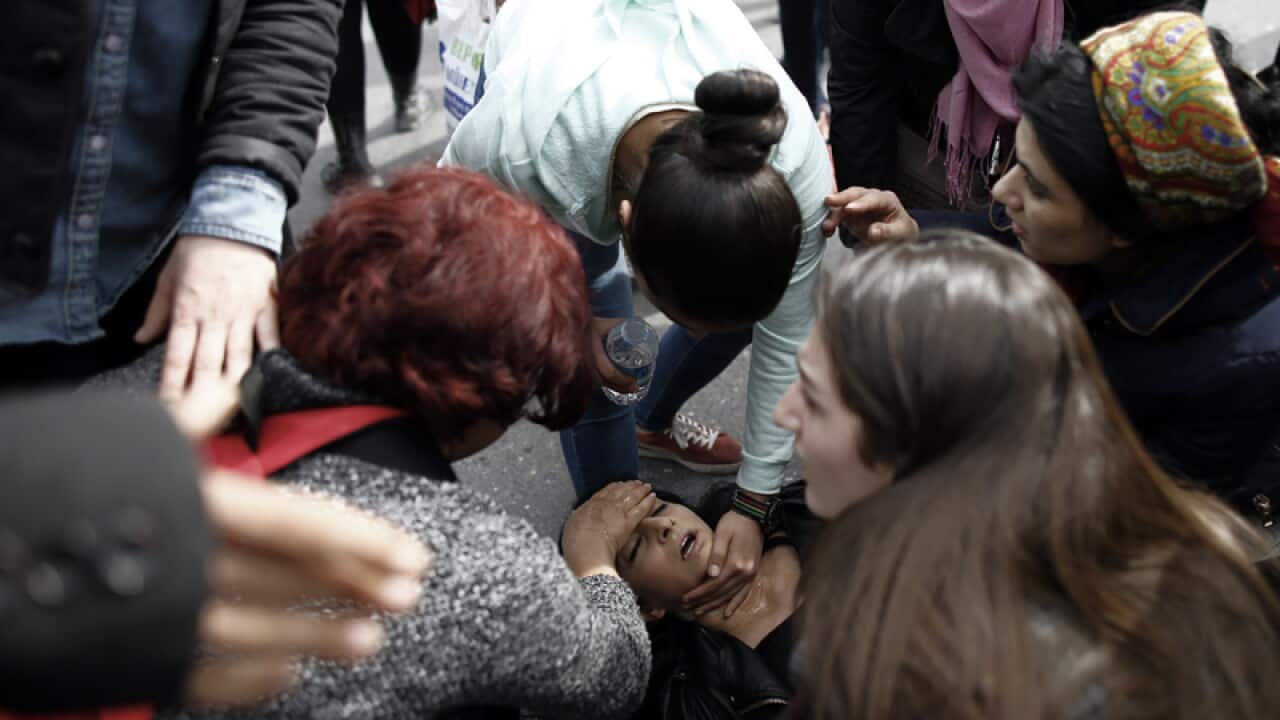 Riot police detain two women