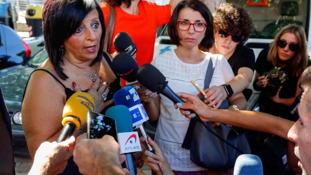 Pilar Abel (L), who has filed a paternity suit to prove she is Spanish artist Salvador Dali's daughter, addresses the media