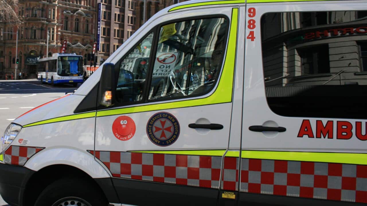 An ambulance drives through Sydney
