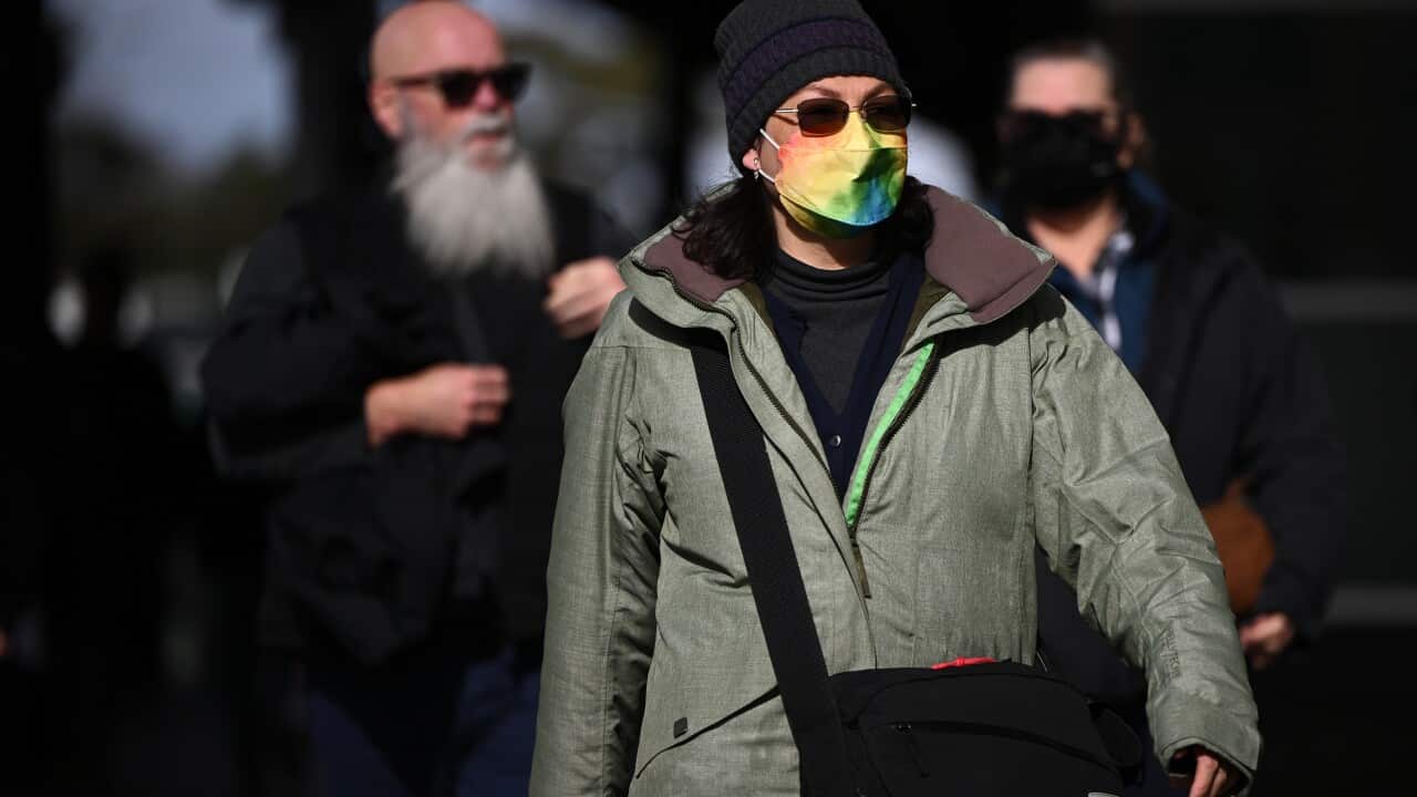 A women wearing a face mask.
