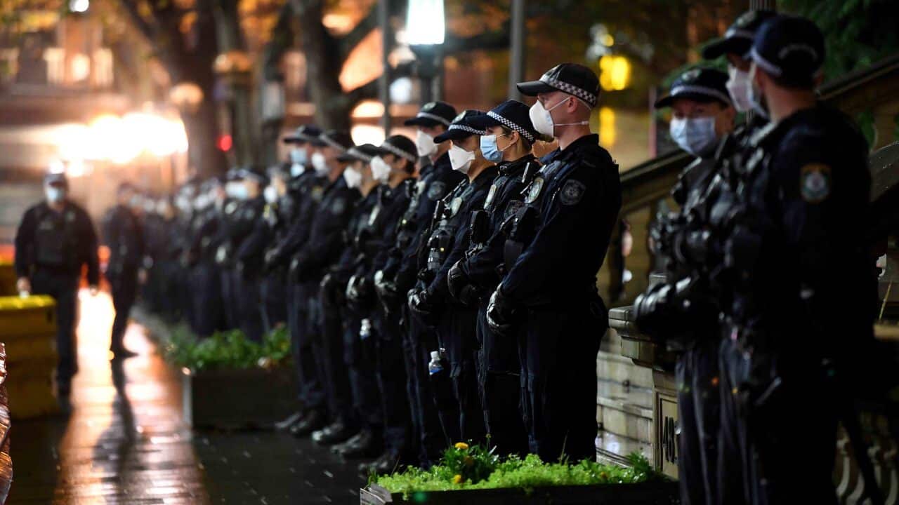 NSW Police ahead of the plaNSW Police standing guard ahead of a previous Black Lives Matter vigil at Sydney Town Hall.nned Black Lives Matter vigil at Sydney Town Hall.