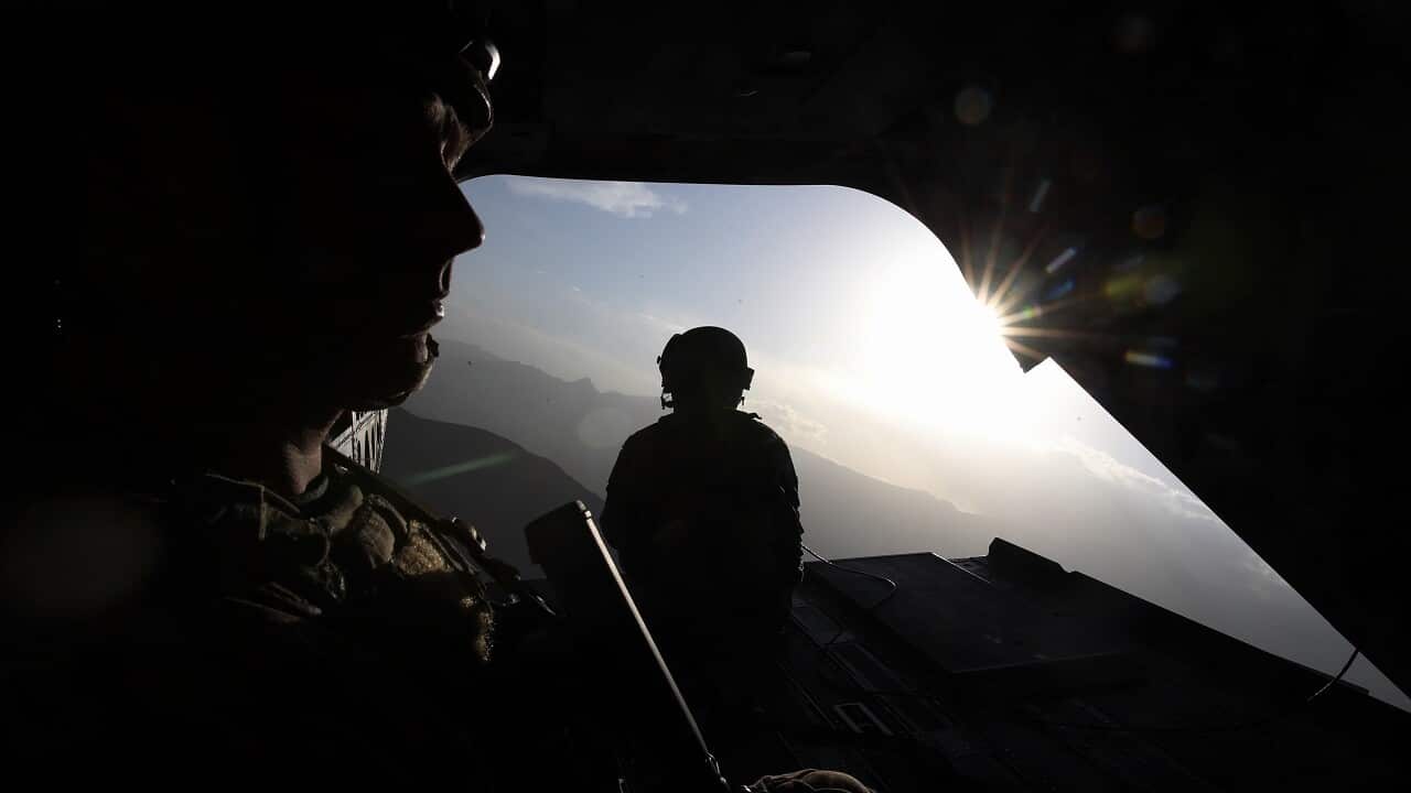 Prime Minister Malcolm Turnbull aboard a CH-47 Chinook during a visit to Afghanistan on Monday 24 April 2017.