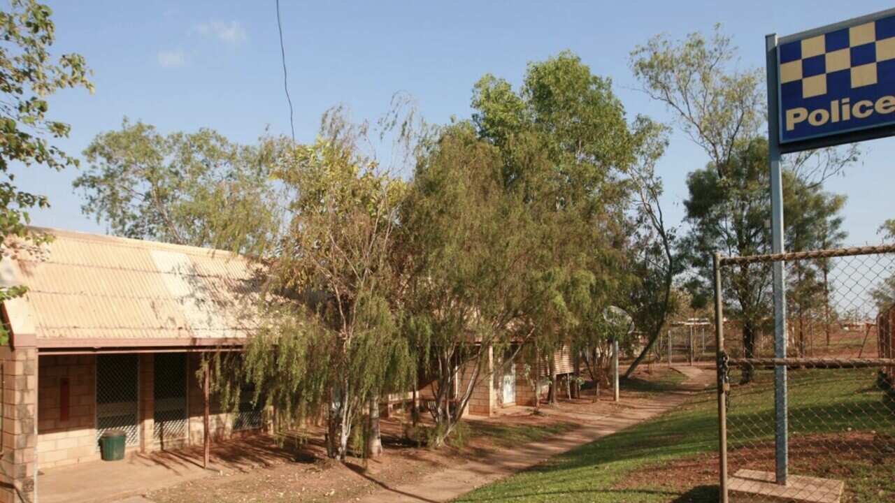 Wadeye and a police sign