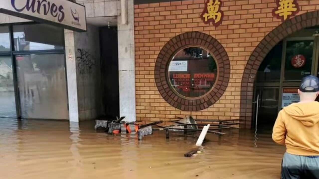 Flooded shopfront of Mandarin Palace.