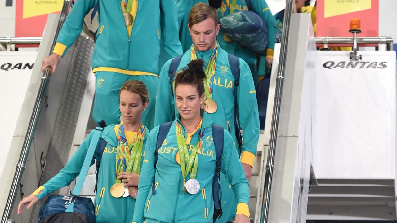 Members of the Australian Olympic team are welcomed home from Rio on their return from the Summer Olympics in Sydney on Wednesday.