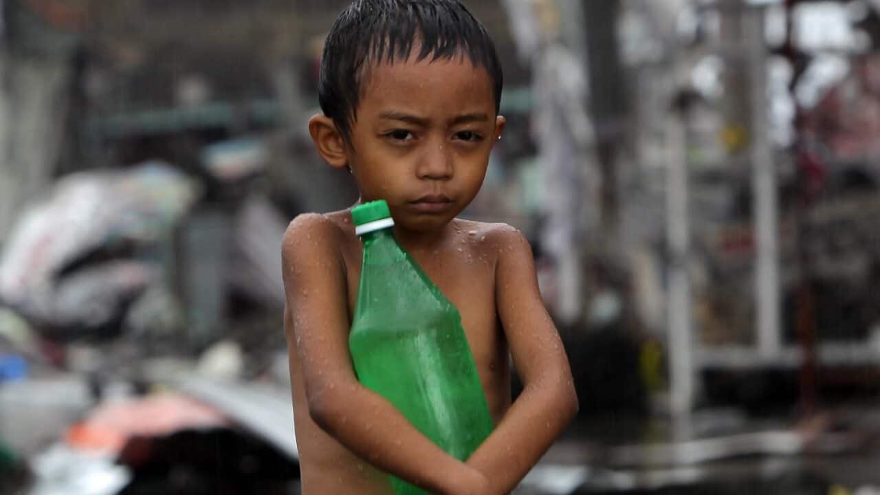 A Philippine child with a water bottle - AAP.jpg