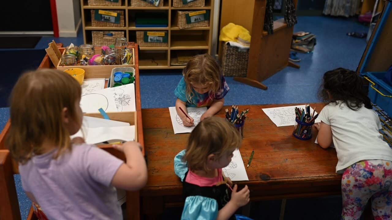 A small group of children play at the Robertson Street Kindy Childcare Centre in Helensburgh south of Sydney.