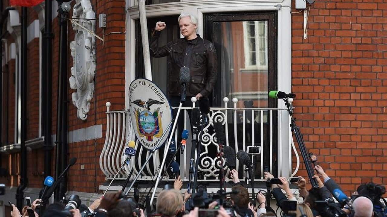 Julian Assange speaks from the balcony of the Ecuadorian Embassy.
