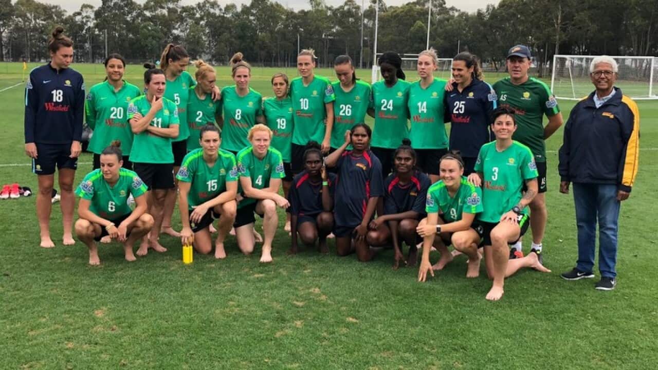 The John Moriarty Foundation scholarship recipients (centre) attended training with the Matildas ahead of their match against Chile
