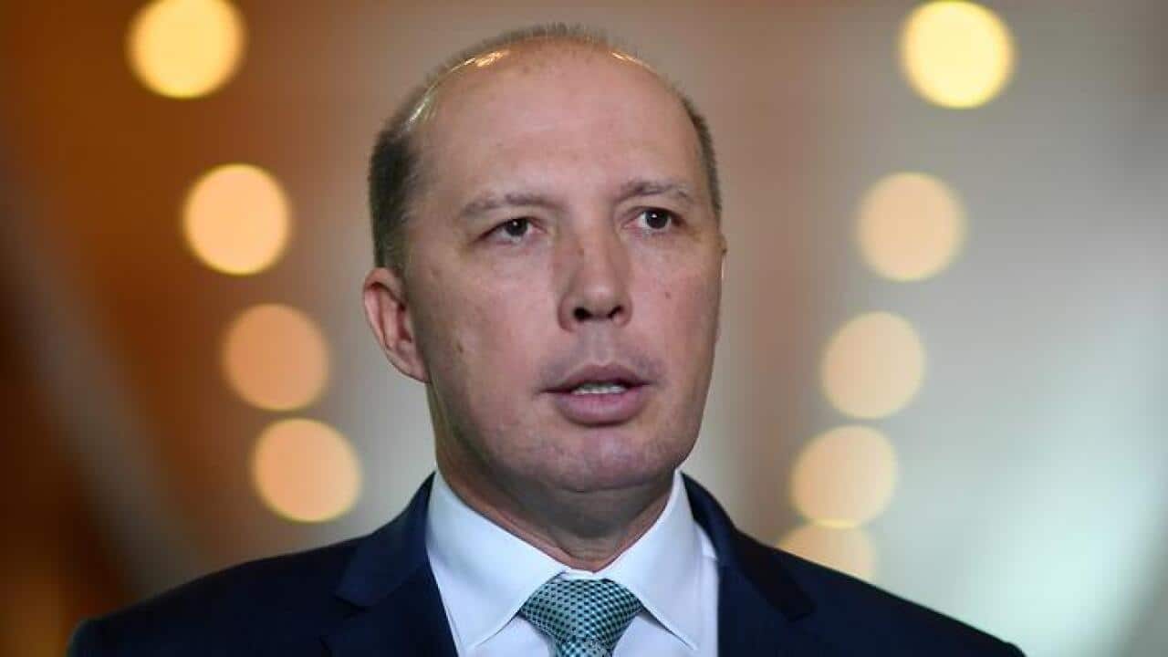 Australian Immigration Minister Peter Dutton speaks to the media during a press conference at Parliament House in Canberra, Thursday, June 1, 2017. (AAP Image/Lukas Coch) NO ARCHIVING