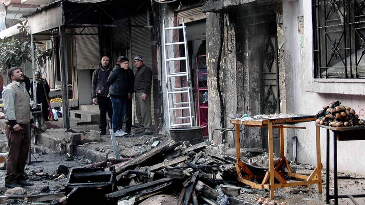 site that was targeted by rocket-propelled grenades, in Homs, Syria