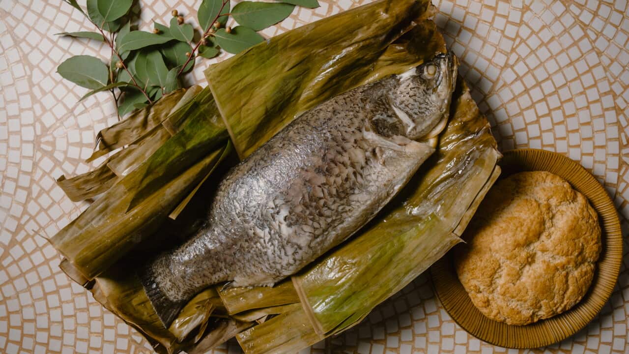 Eucalyptus baked whole barramundi