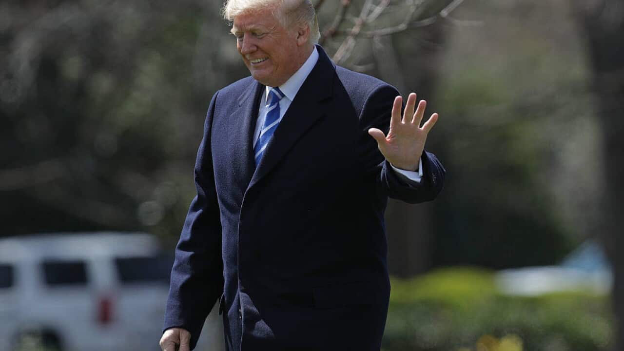 President Donald Trump walks across the South Lawn before boarding Marine One and leaving the White House April 5, 2018 in Washington, DC.