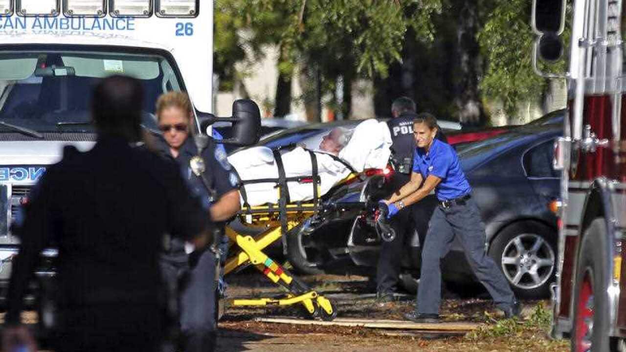 A woman is transported from The Rehabilitation Center at Hollywood Hills as patients are evacuated after a loss of air conditioning due to Hurricane Irma