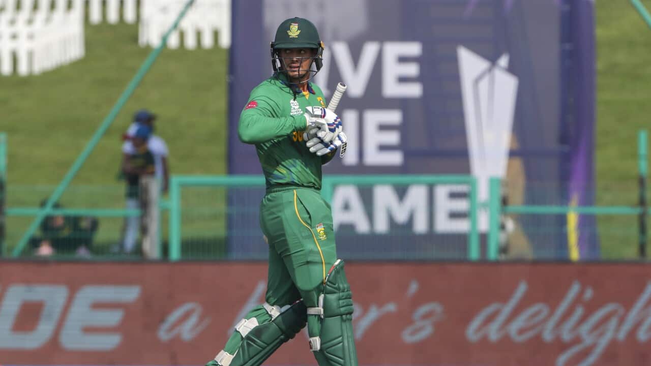 South Africa's Quinton de Kock walks from the field after he was dismissed during the Cricket Twenty20 World Cup match between South Africa and Australia in Abu Dhabi, UAE, Saturday, Oct. 23, 2021. (AP Photo/Kamran Jebreili )