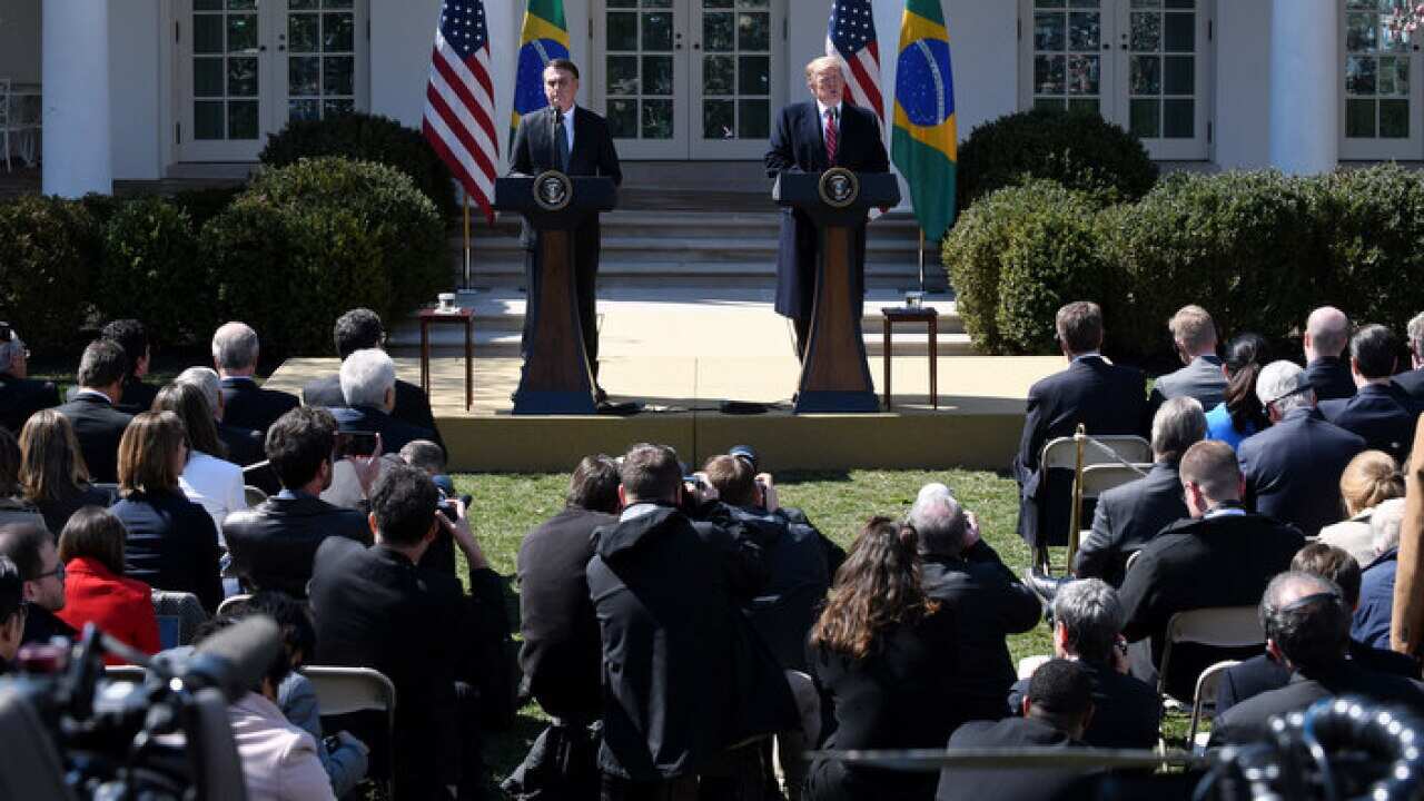 US President Donald Trump speaks during a joint news conference with Brazilian President Jair Bolsonaro in the Rose Garden