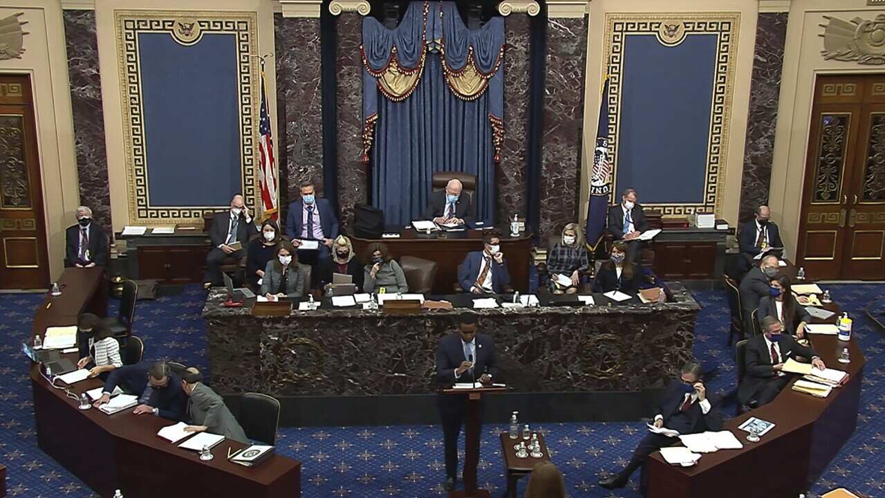 In this image from video, House impeachment manager Joe Neguse speaks at the second impeachment trial of Donald Trump in the Senate in Washington on Wednesday.