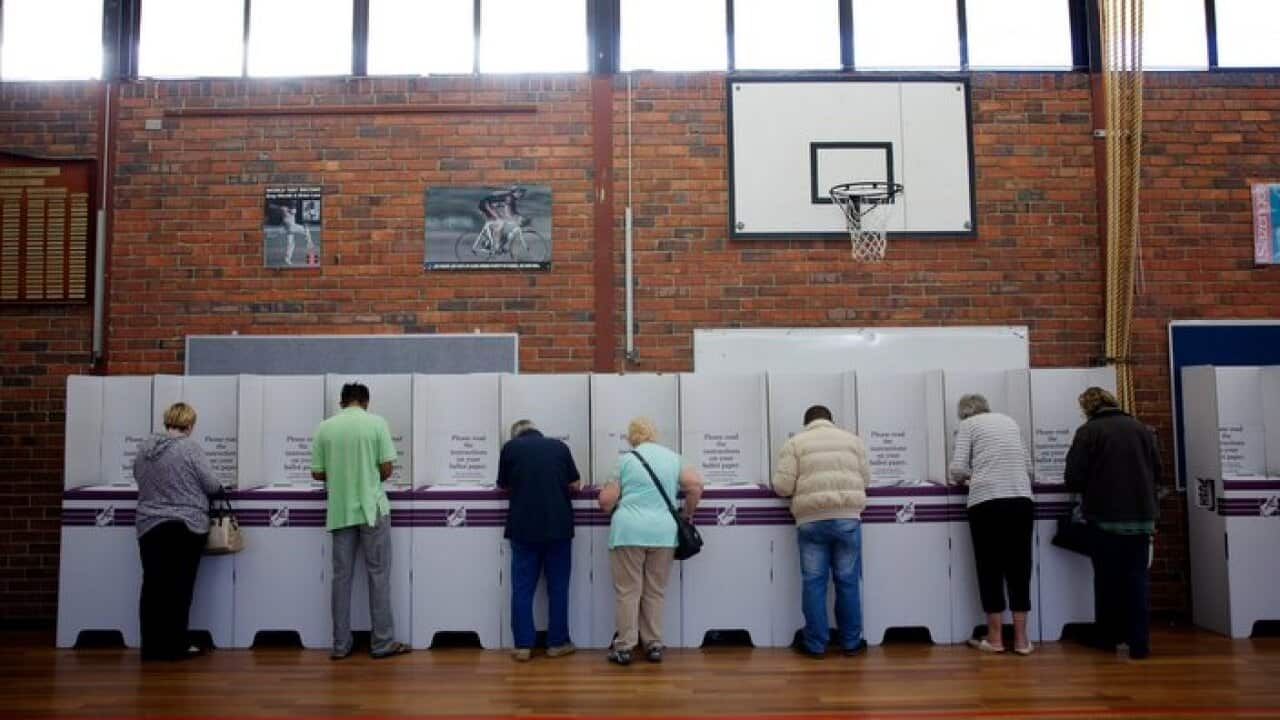 Members of the public casting their vote