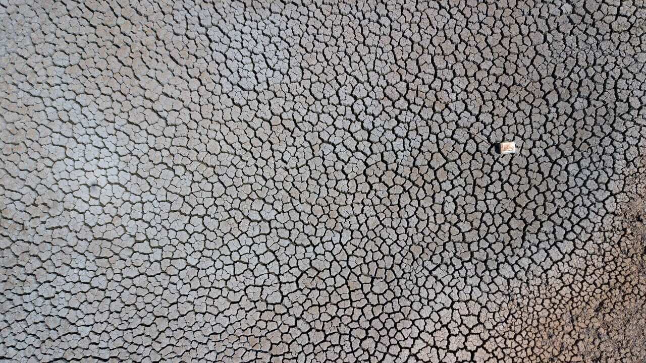 An aerial view of a dried up dam at Cottonvale apple orchard, outside the drought ravaged town of Stanthorpe, south west of Brisbane, Friday, October 4, 2019