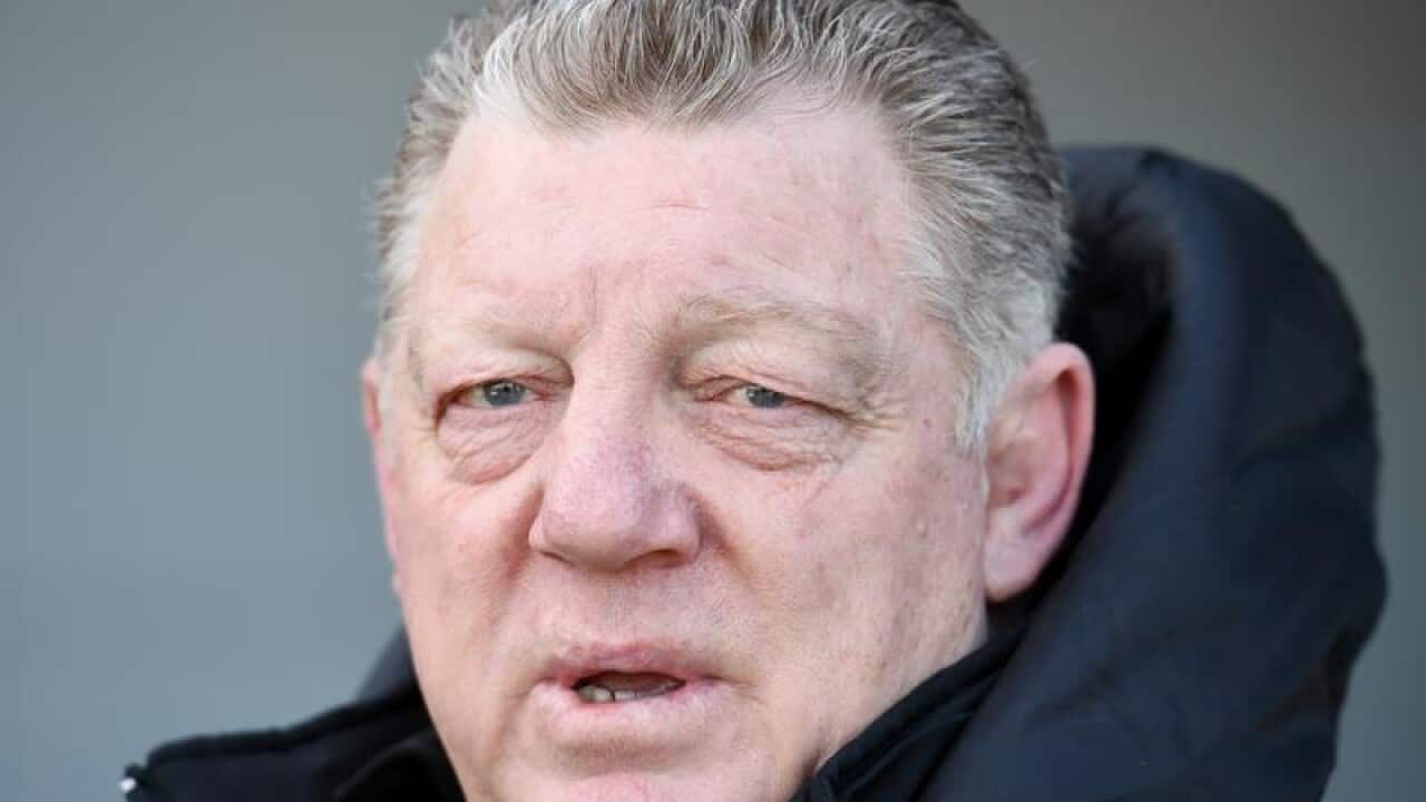 Phil Gould departs following a press conference.