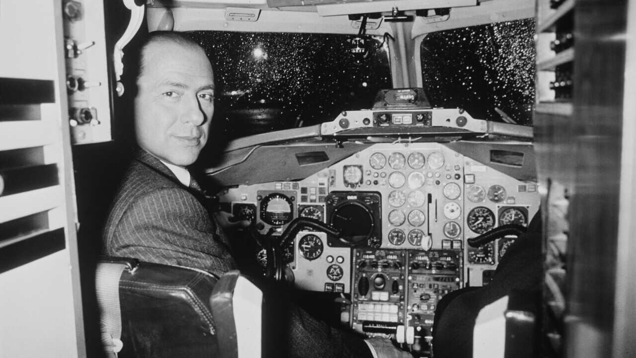 Businessman Silvio Berlusconi Departing France