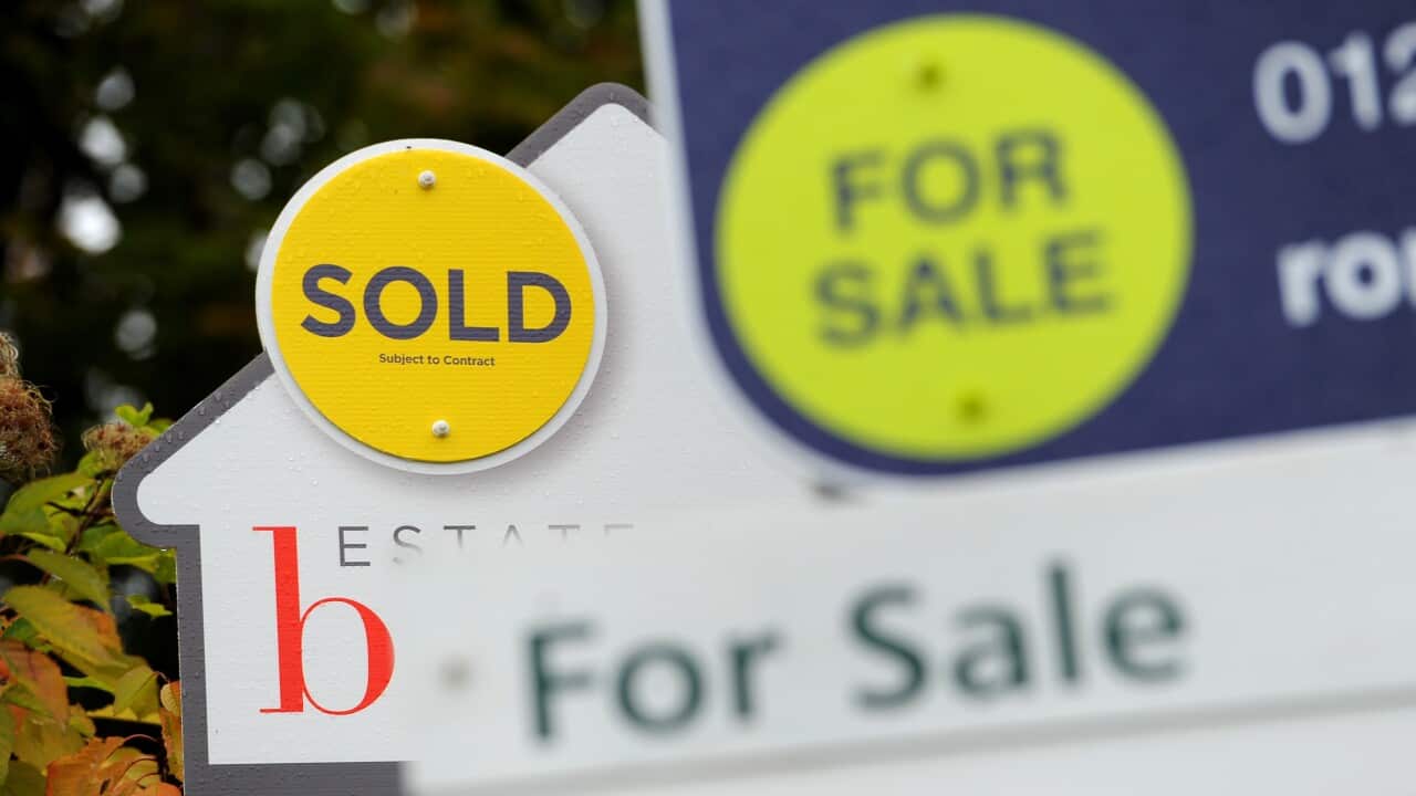 General view of Sold and For Sale signs outside a block of flats in Basingstoke, hampshire