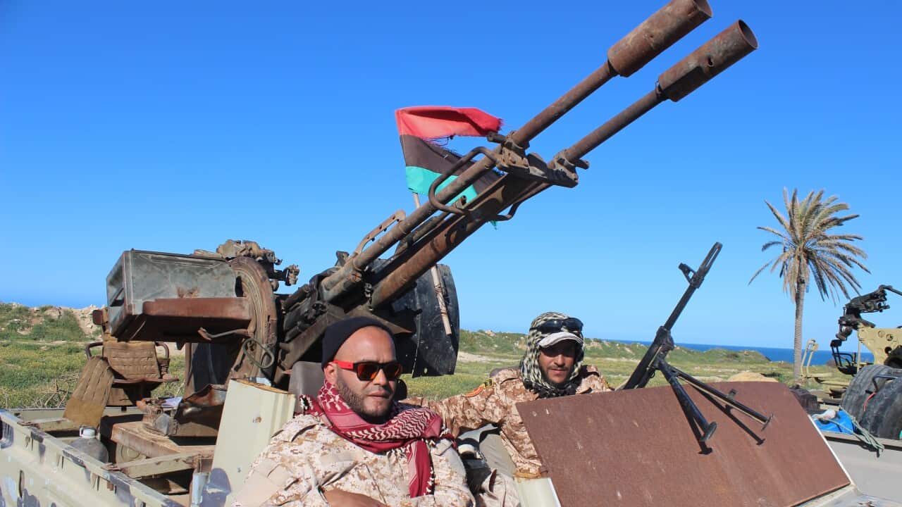 Vehicles and militants, reportedly from the Misrata militia, gather to join Tripoli forces, in Tripoli, Libya.