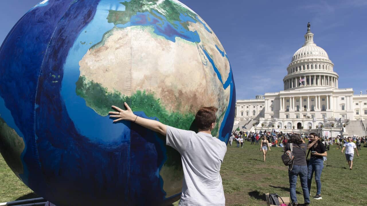 An inflatable globe seen at the West Front of the US Capitol following the climate strike march in Washington, DC, USA, 20 September 2019.