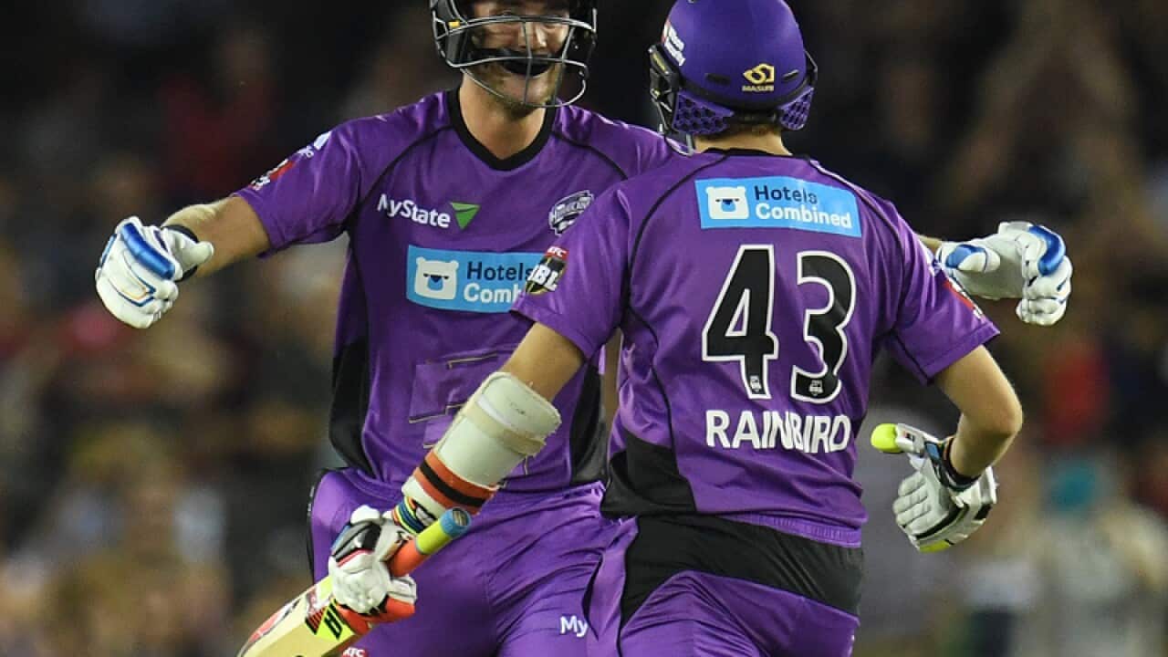 Stuart Broad (L) and Sam Rainbird of the Hurricanes react