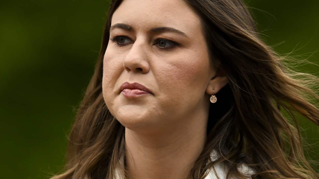 Brittany Higgins walking outside.