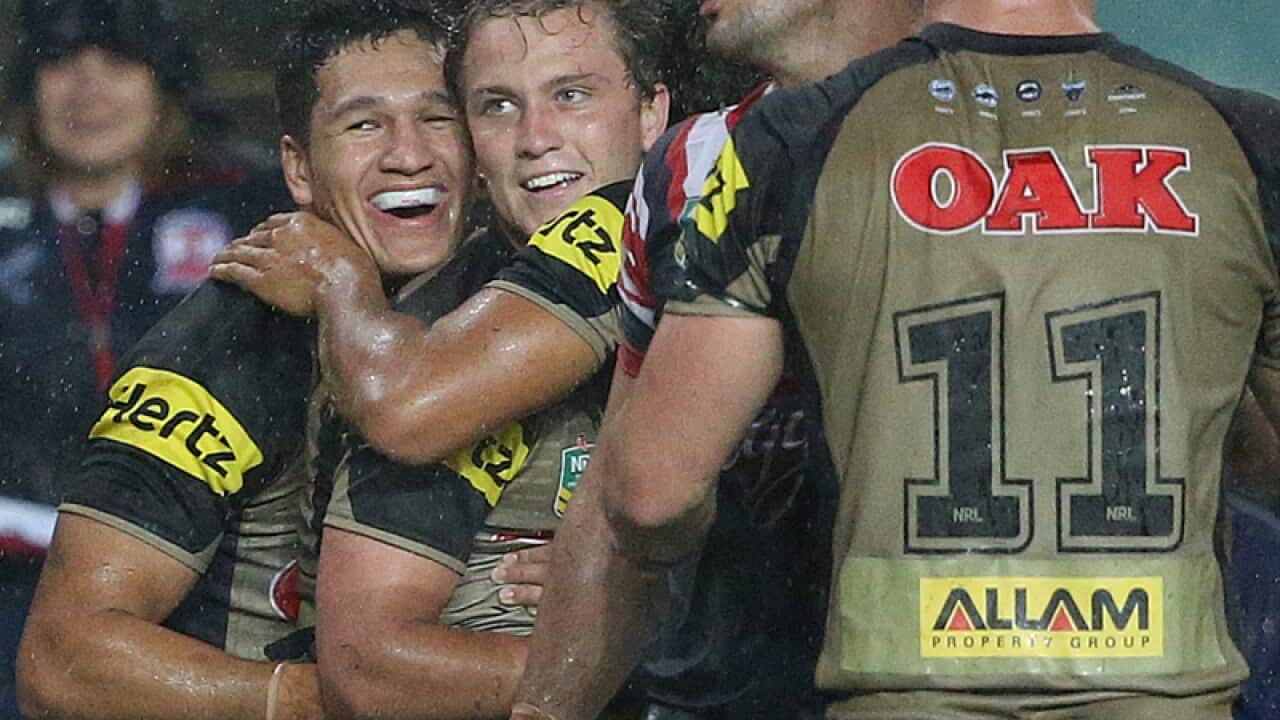 Penrith Panthers' Te Maire Martin (2nd left)
