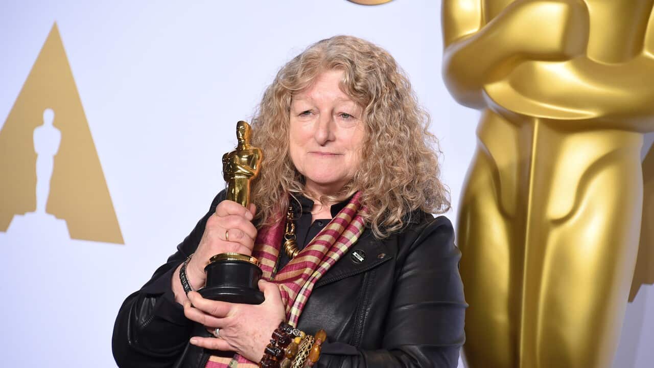 enny Beavan poses with the award for best costume design for “Mad Max: Fury Road” in the press room at the Oscars.