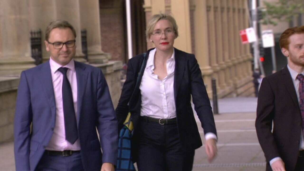 ead plaintiff Robyn Richardson (centre) outside court