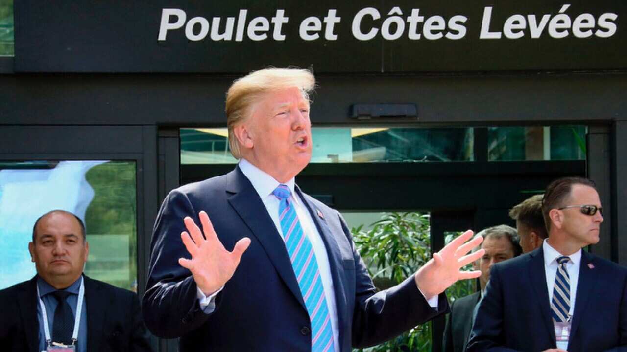 U.S. President Donald Trump speaks to reporters in Charlevoix, Canada, on June 9, 2018. (Pool photo)(Kyodo via AP Images) ==Kyodo
