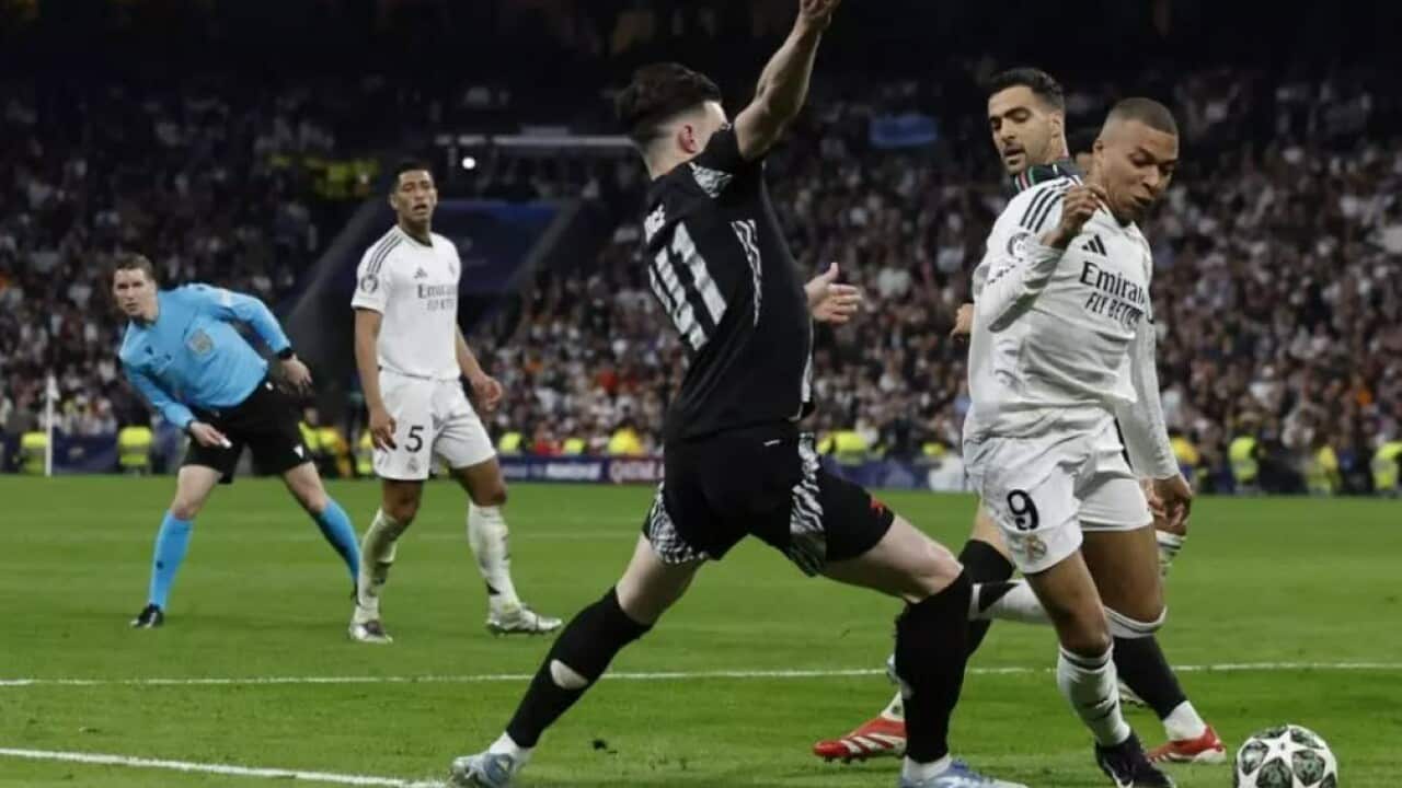 Real v Arsenal AFP Oscar Del Pozo Le Français Kylian Mbappé (d) lors du match retour face à Arsenal en quarts de finale, le 16 avril 2025. AFP - OSCAR DEL POZO.jpg