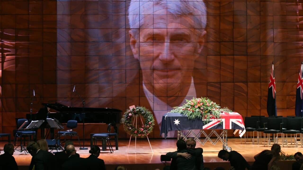 The casket of Anthony Foster is seen at his state funeral