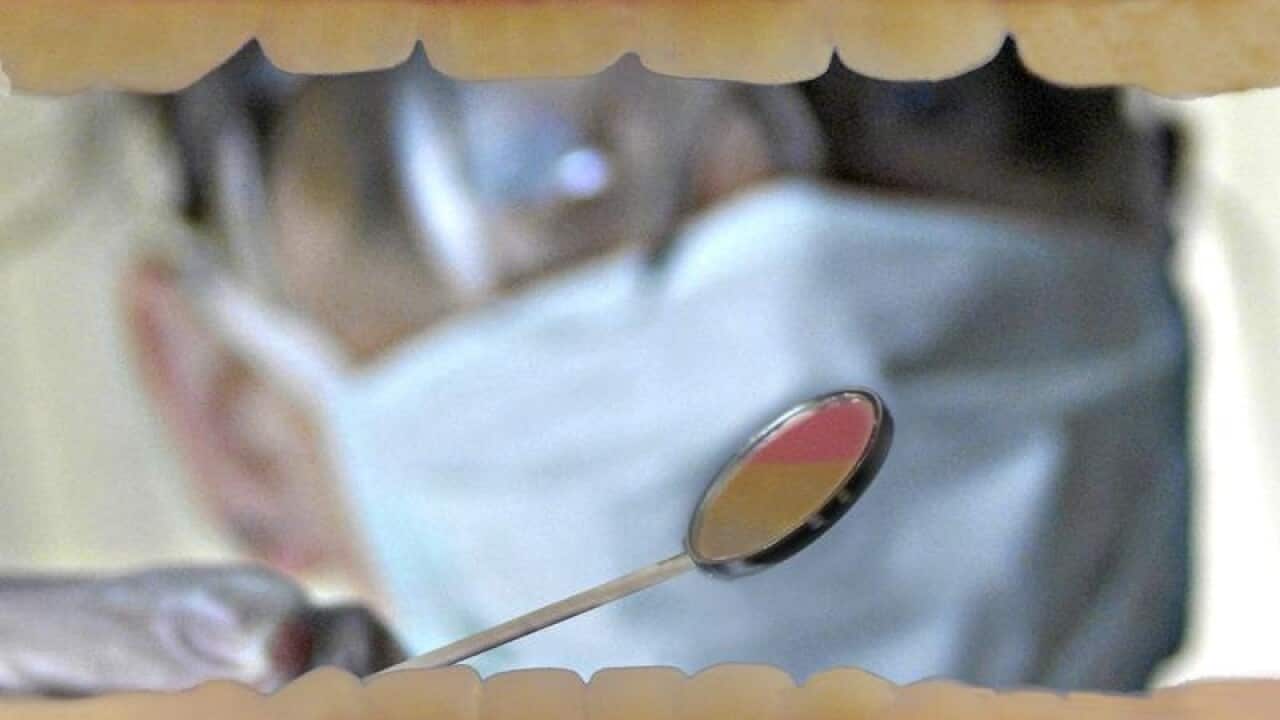 A file photograph illustrating a dental check up