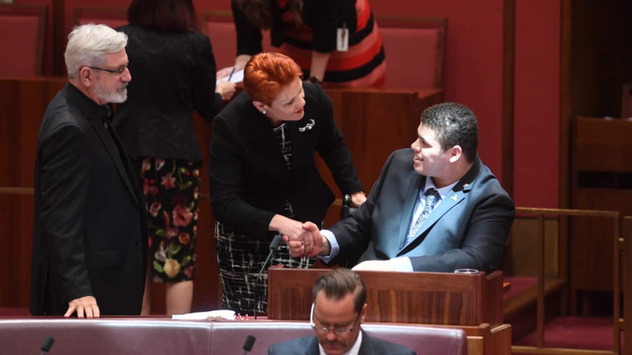 Australian Greens Senator Jordon Steele John arrives to be sworn in in the Senate chamber at Parliament House in Canberra.