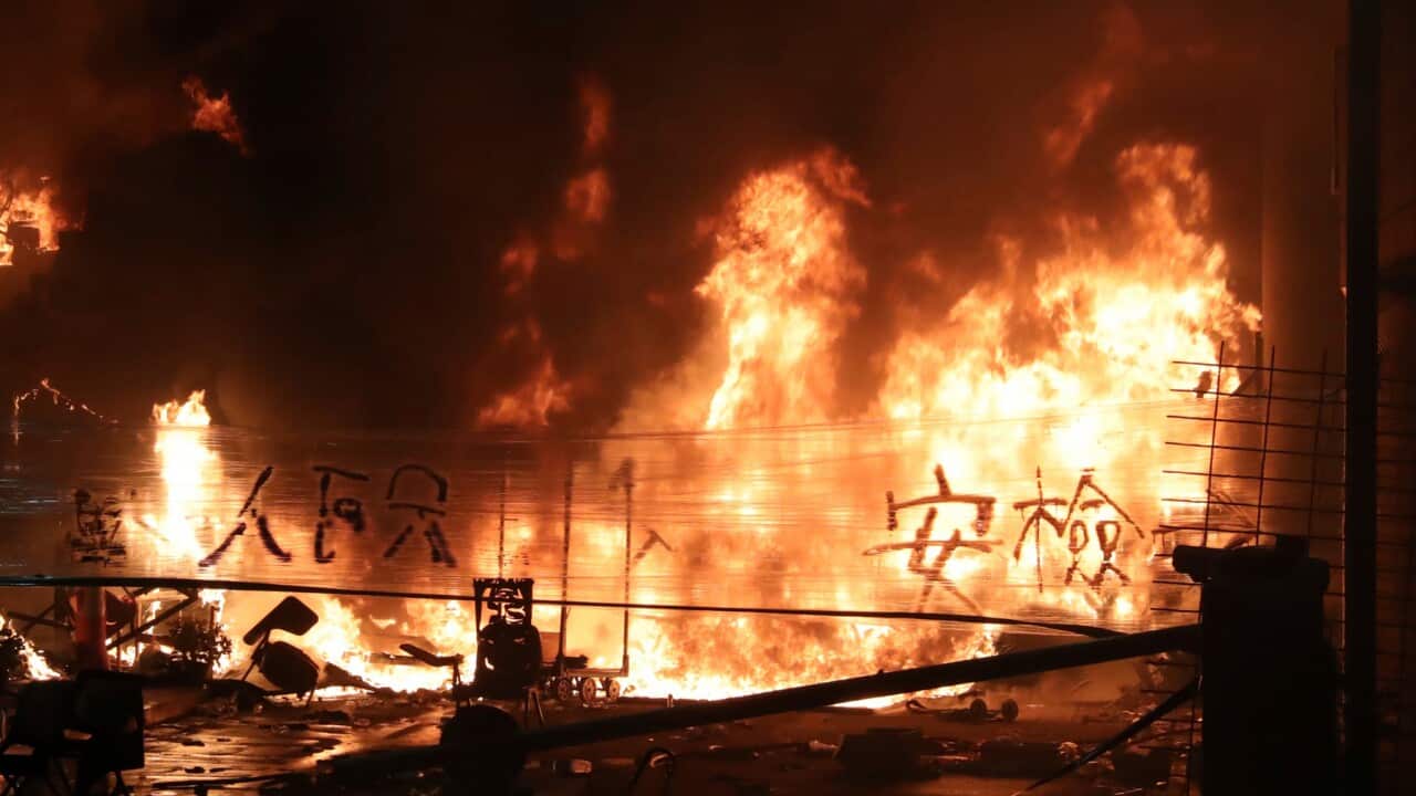 Fires set by protesters at Hong Kong Polytechnic University as police used tear bombs to remove them