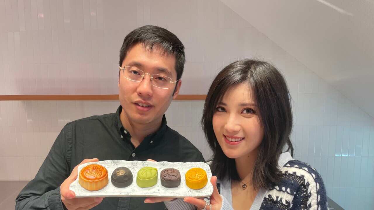 Steve Hou and Lucy Lu with some of their mooncakes at SweetLu