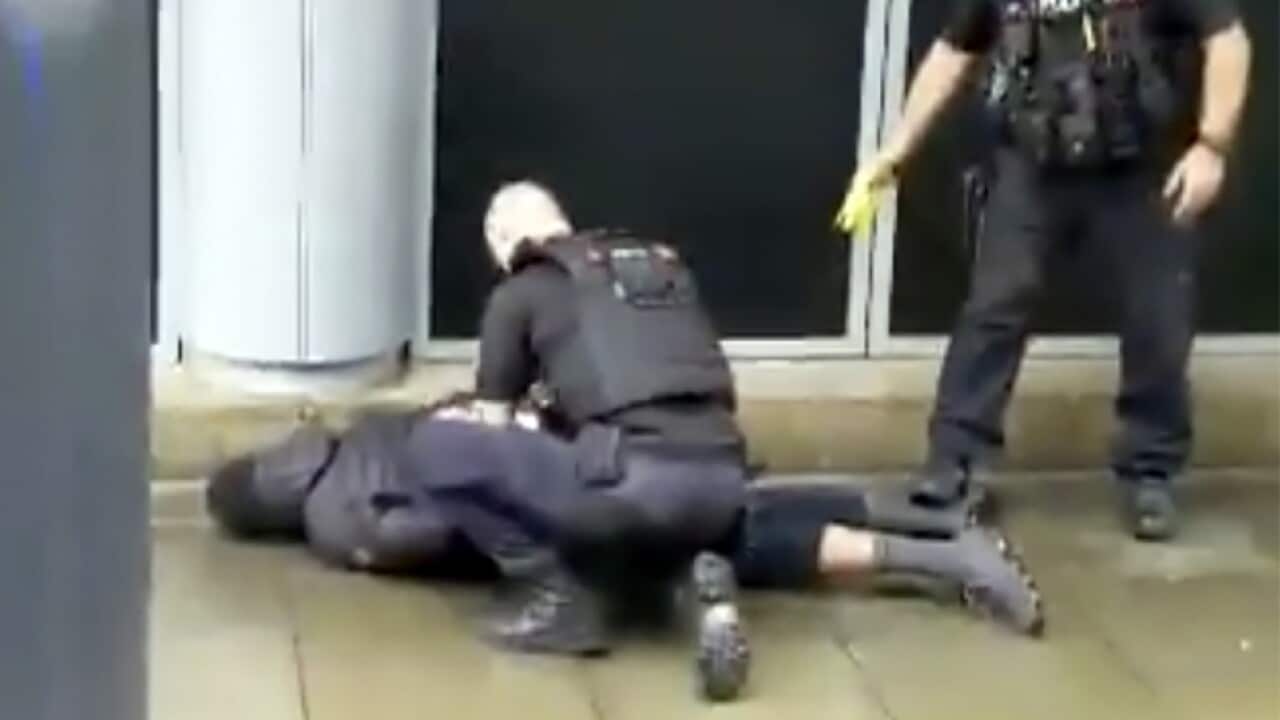 Police arrest the man suspected of carrying out the attack in Manchester, England.