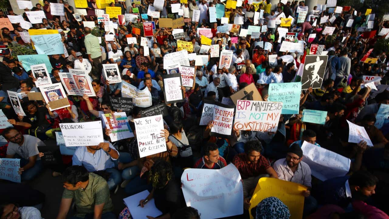 Protesters holds placard and shouts slogans during a protest in solidarity against the Citizenship Amendment Bill (CAB) and National Register of Citizens (NRC).