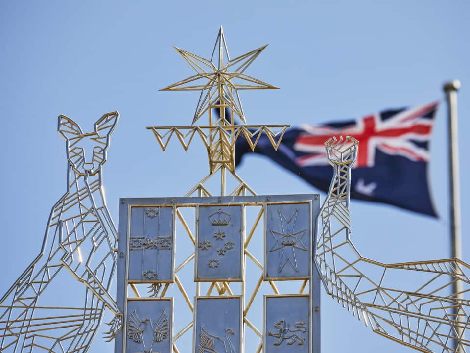 Australian Coat of Arms with Kangaroo and Emu symbol at entrance to Parliament House Canberra, Australia