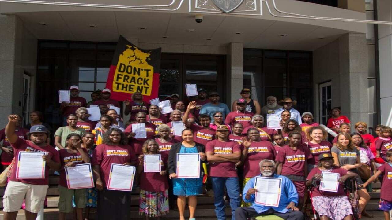 Anti fracking protesters gathered on Darwin's parliament steps.