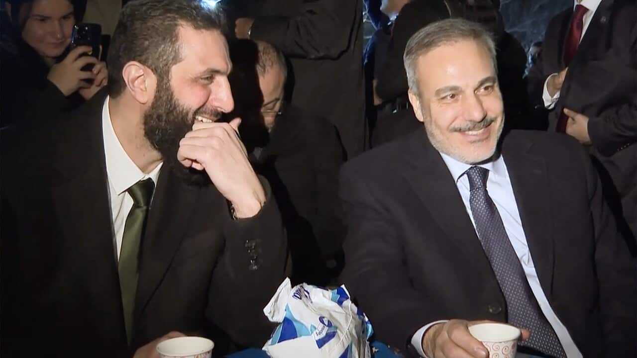 Turkiye's Foreign Minister Hakan Fidan with new Syrian leader Ahmed al-Sharaa (AAP)