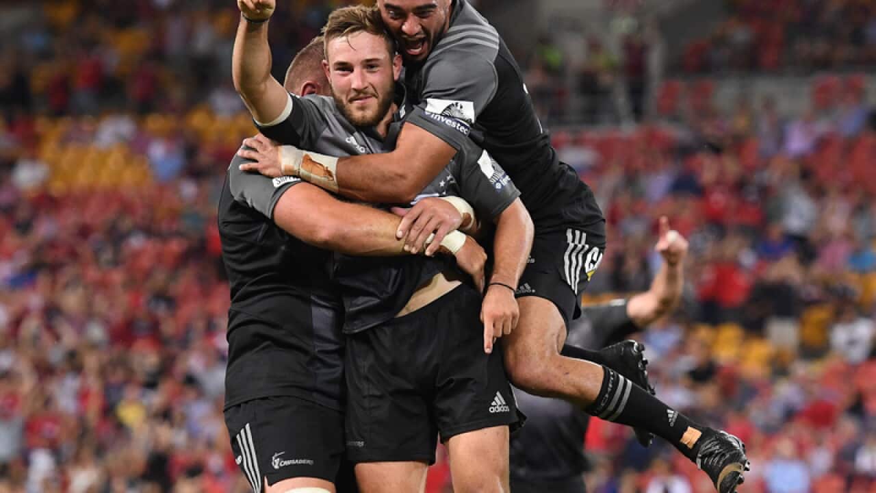 Crusaders player Mitch Hunt celebrates