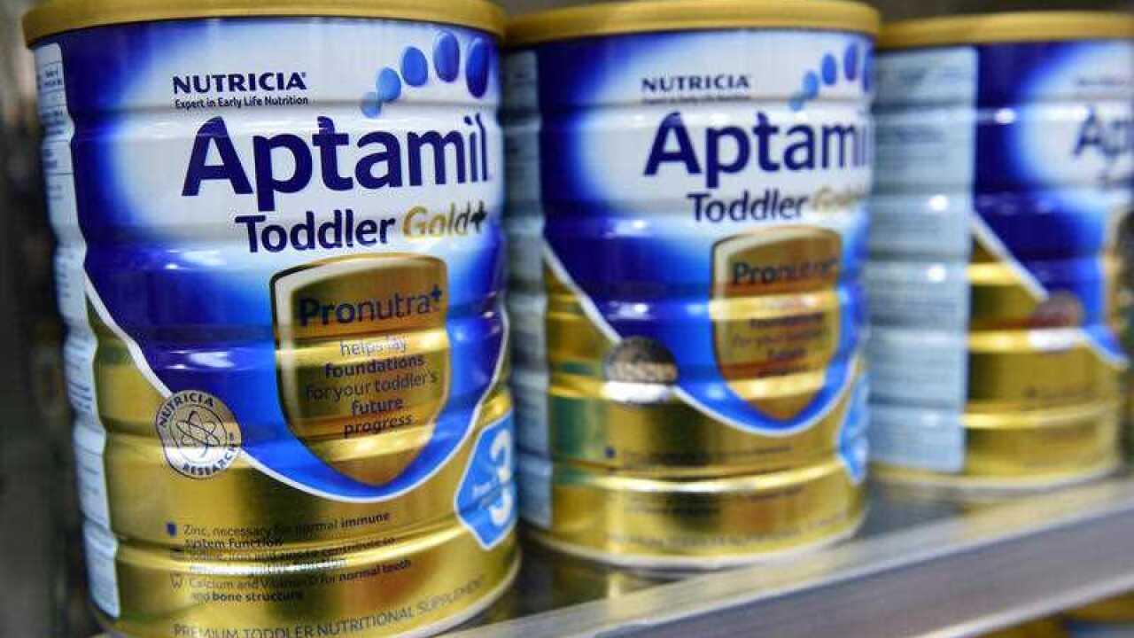 A stock image of baby formula at a store.