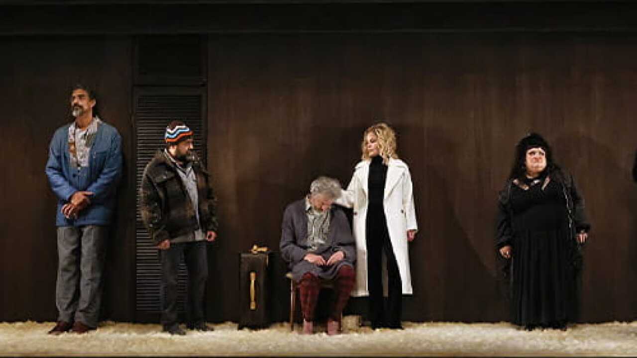 Actors onstage during a play.